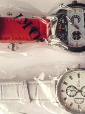 BRAND NEW PAIR OF WRIST WATCHES.